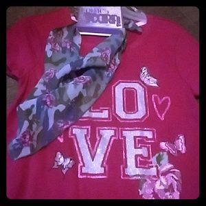 a t-shirt and scarf